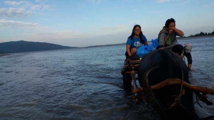 Researchers cross a lahar-choked river while bound for Palis, Botolan, Zambales