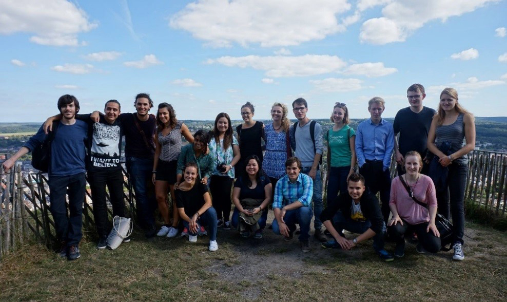 UPPI students Mia Perez (standing, 6th from left) & Celes Hermida (seated, 2nd from left) on an educational tour in Belgium with fellow students from other countries