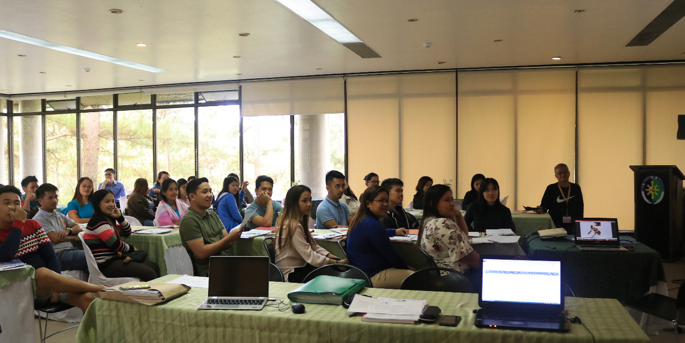 NMS field workers for CAR intently listen to a trainor during their training [in Baguio City, Benguet; in July 2018]
