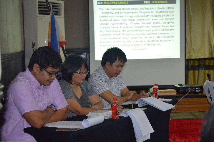 Assoc. Prof. Maria Paz Marquez sits as one of the judges  during the 2015 NCR Regional PopQuiz